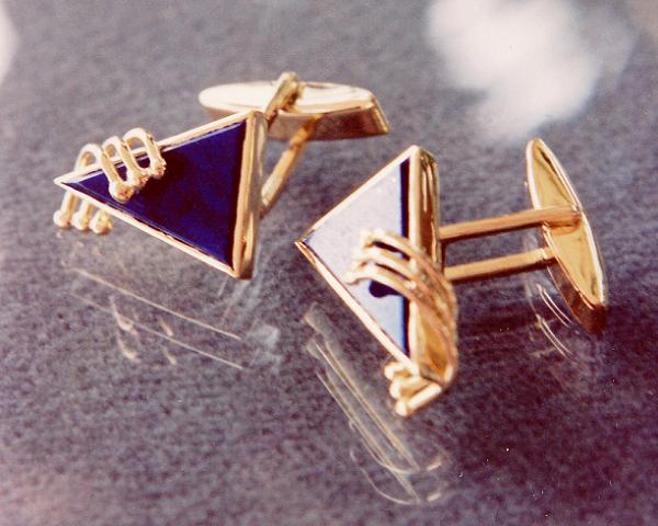 Lapis set in fourteen karat yellow cuff links