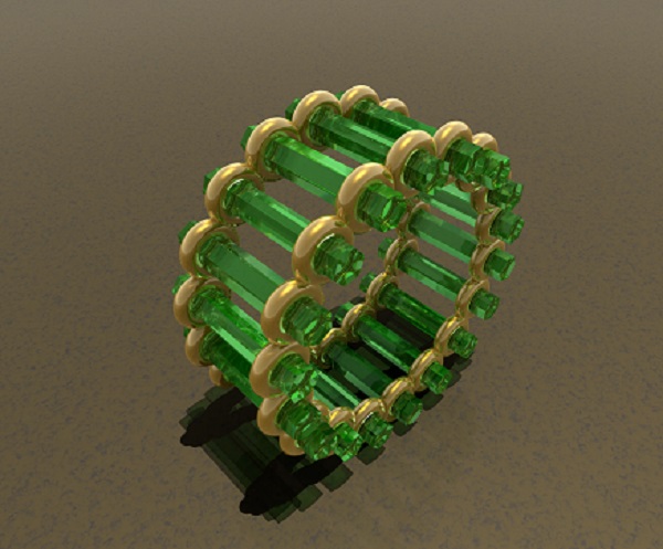 Hexagonal Emeralds set in 18kt yellow gold.