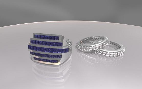 Princess cut Sapphire Ring and two eternity rings set with Diamonds